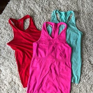 Set of Three Racerback Tank Tops - Red, Pink, and Teal